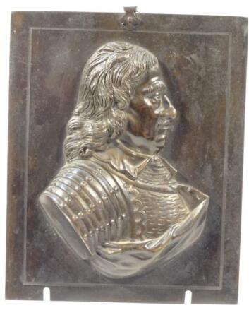 A 20thC relief metal plaque