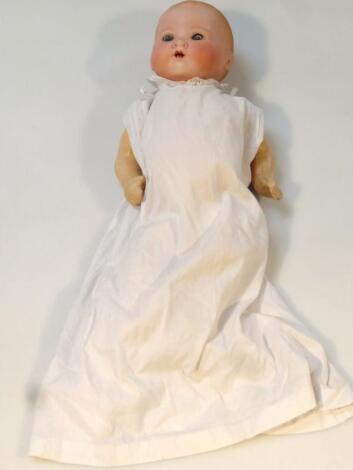 An early 20thC Armand Marseille German bisque headed baby doll