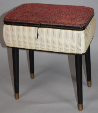 A 1970's retro freestanding sewing box