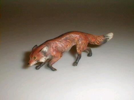 A cold painted bronze figure of fox