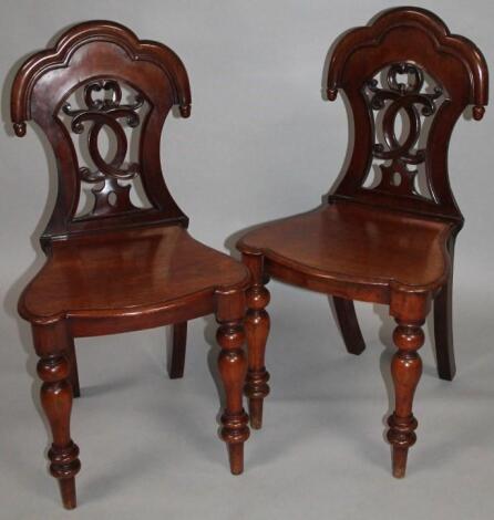 A pair of mid-19thC mahogany hall chairs