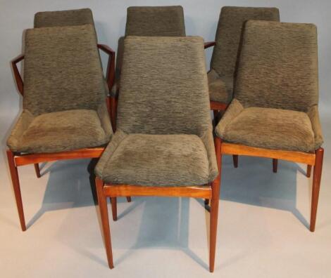 A set of six 1970's teak framed dining chairs