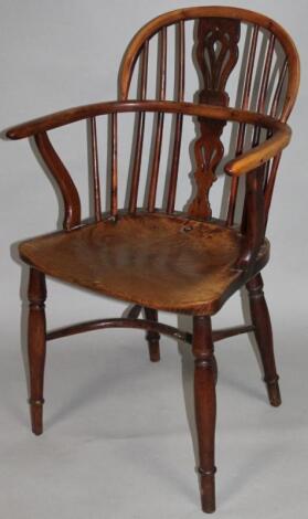 A 19thC yew and elm low back Windsor chair