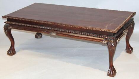 A 20thC mahogany finish coffee table