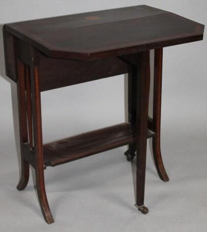 An Edwardian mahogany stained and boxwood strung Sutherland table