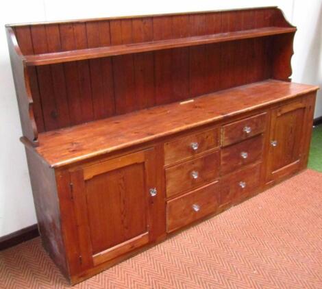 A 19thC pine kitchen dresser or shop display