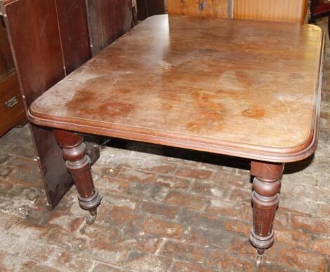 A 19thC mahogany dining table