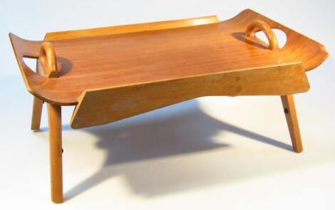 A 20thC patented centurion teak tray