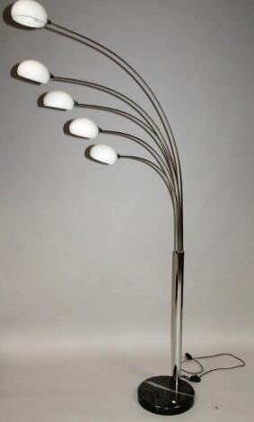 A retro style chrome plated floor lamp