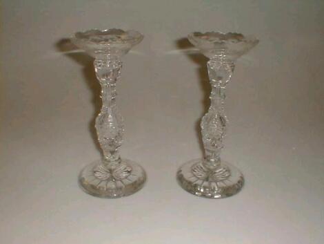 A pair of cut crystal candle sticks