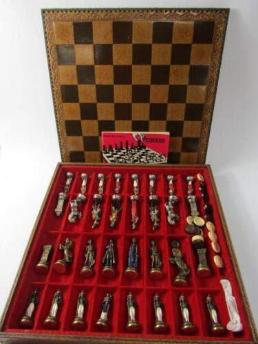 An Italian cast metal chess set modelled as Napoleonic figures