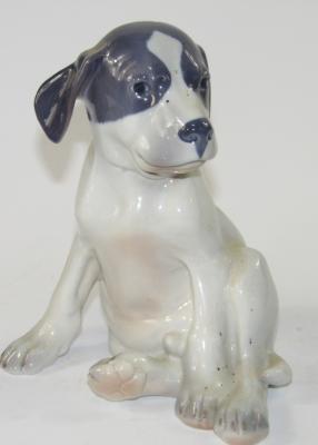 A Royal Copenhagen model of a seated puppy