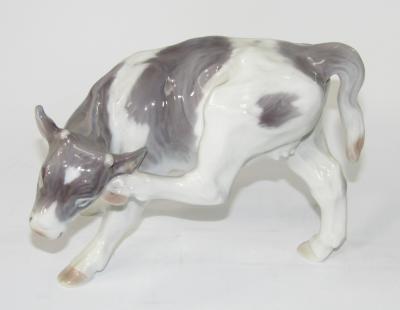 A Royal Copenhagen model of a Friesian heifer