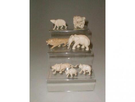 A group of carved ivory figures of wild animals £50-80