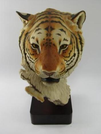 A resin sculpture of a tiger's head