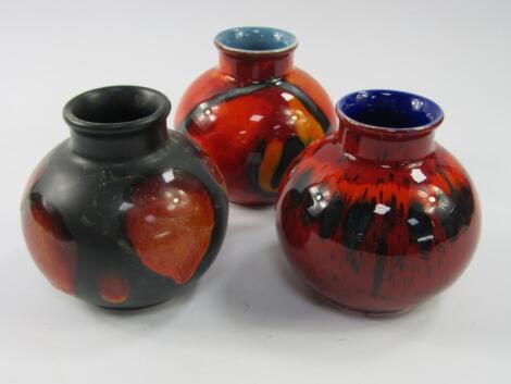 Three Poole Pottery vases