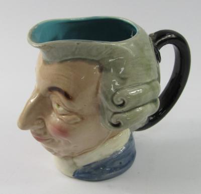 A late 19thC/early 20th Sarreguemines French character jug