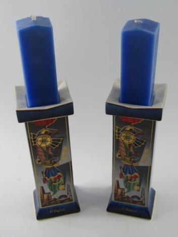 A pair of Goebel Artists Orbis candlestisks designed by P Kaplun