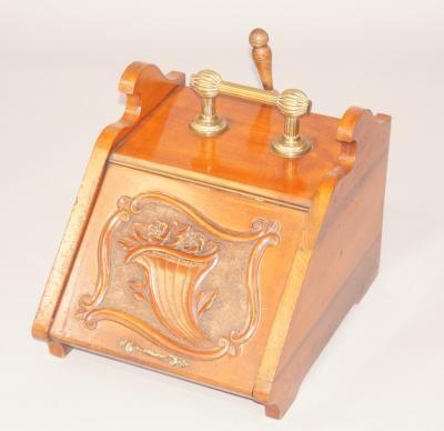 A Victorian walnut coal scuttle