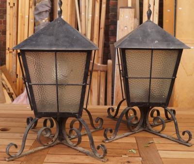 A pair of metal cased garden lantern tops