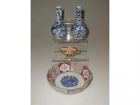 An Imari bowl, with six character marks in under glaze blue,