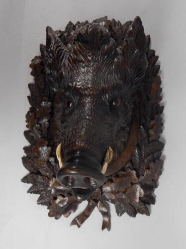 A late 19thC/early 20thC Black Forest linden wood carving