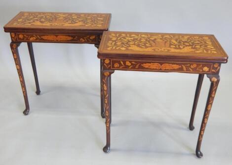 A pair of early 19thC Dutch mahogany and floral marquetry card tables