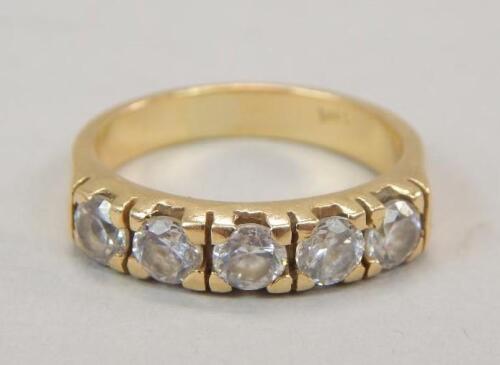 A diamond five stone dress ring