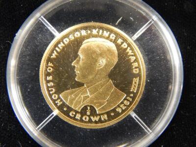 A commemorative 1/5 crown gold coin - 2