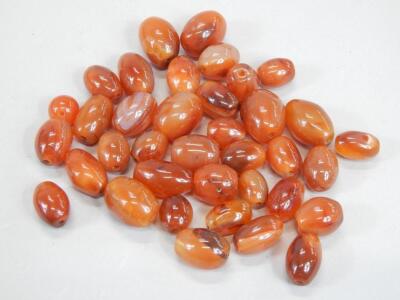 A quantity of loose amber beads.