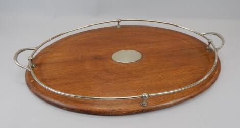 An early 20thC oak two handled tray