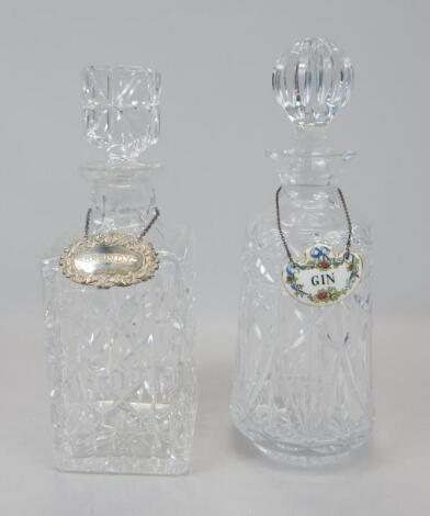 Two cut glass decanters and stoppers