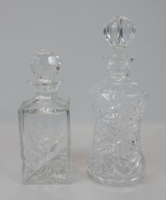 Two cut glass decanters and stoppers