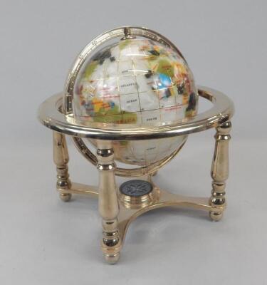 An Osbourne & Clark Limited gemstone globe