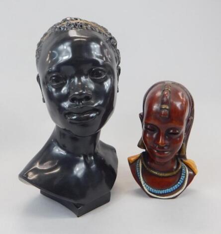 Two composition African busts