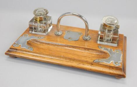 An early 20thC oak inkstand