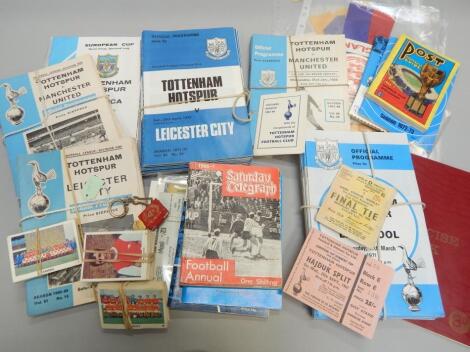 A quantity of football programmes