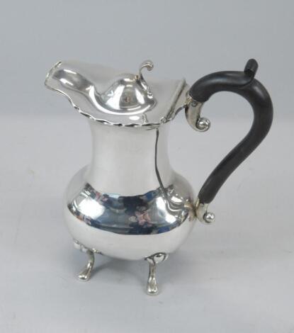 A small Edwardian hot water jug