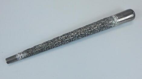 A white metal parasol handle