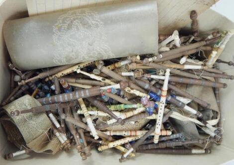 A quantity of bone and turned wooden lace bobbins