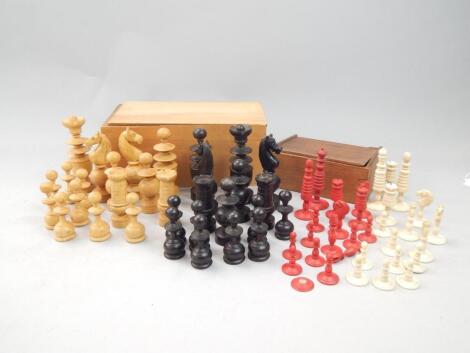 A red stained bone part chess set