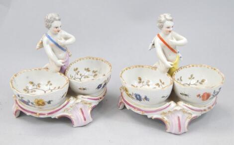 A pair of early 19thC German porcelain table salts