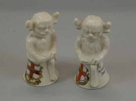 Two crested porcelain Lincoln Imps