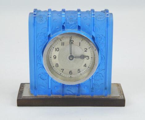 An Art Deco style blue glass mantel timepiece