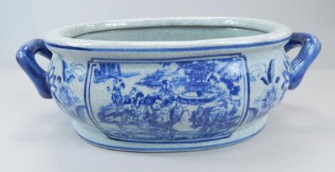 A modern Chinese style porcelain two handled oval tureen or foot bath