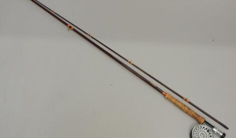 A Hardy two piece 8½ft fly fishing rod and a Hardy Marquis 6 reel