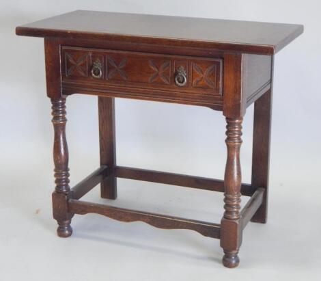 A reproduction oak side table