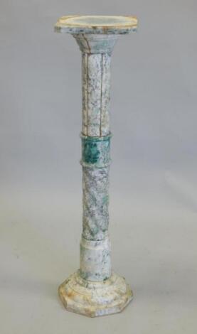 A green stained marble column