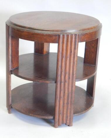 An Art Deco style oak three tier occasional table