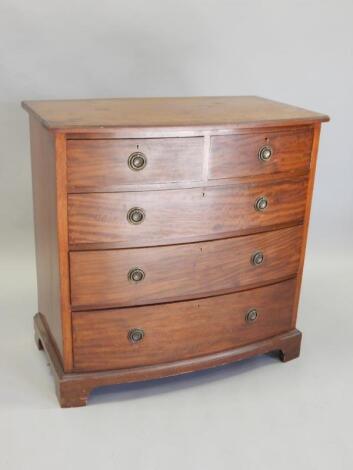 An Edwardian mahogany bow fronted chest of drawers